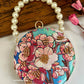 Poppy Floral Round Multicolored Clutch ( Blue base)