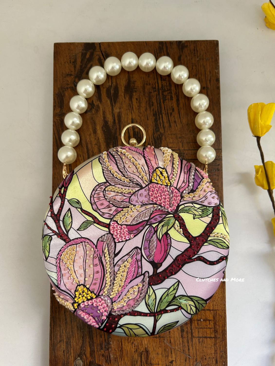 Poppy Floral Round Multicolored Clutch ( Lavender Base )