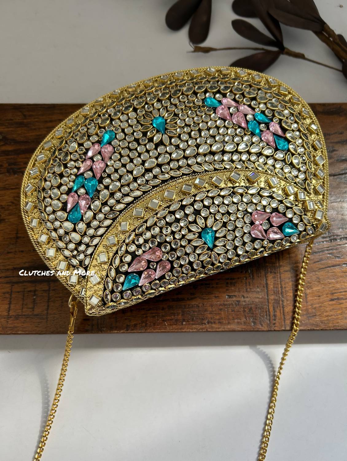 Kasika Kundan Brass Clutch with Pink Blue