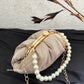 Crush Batua bag Gold