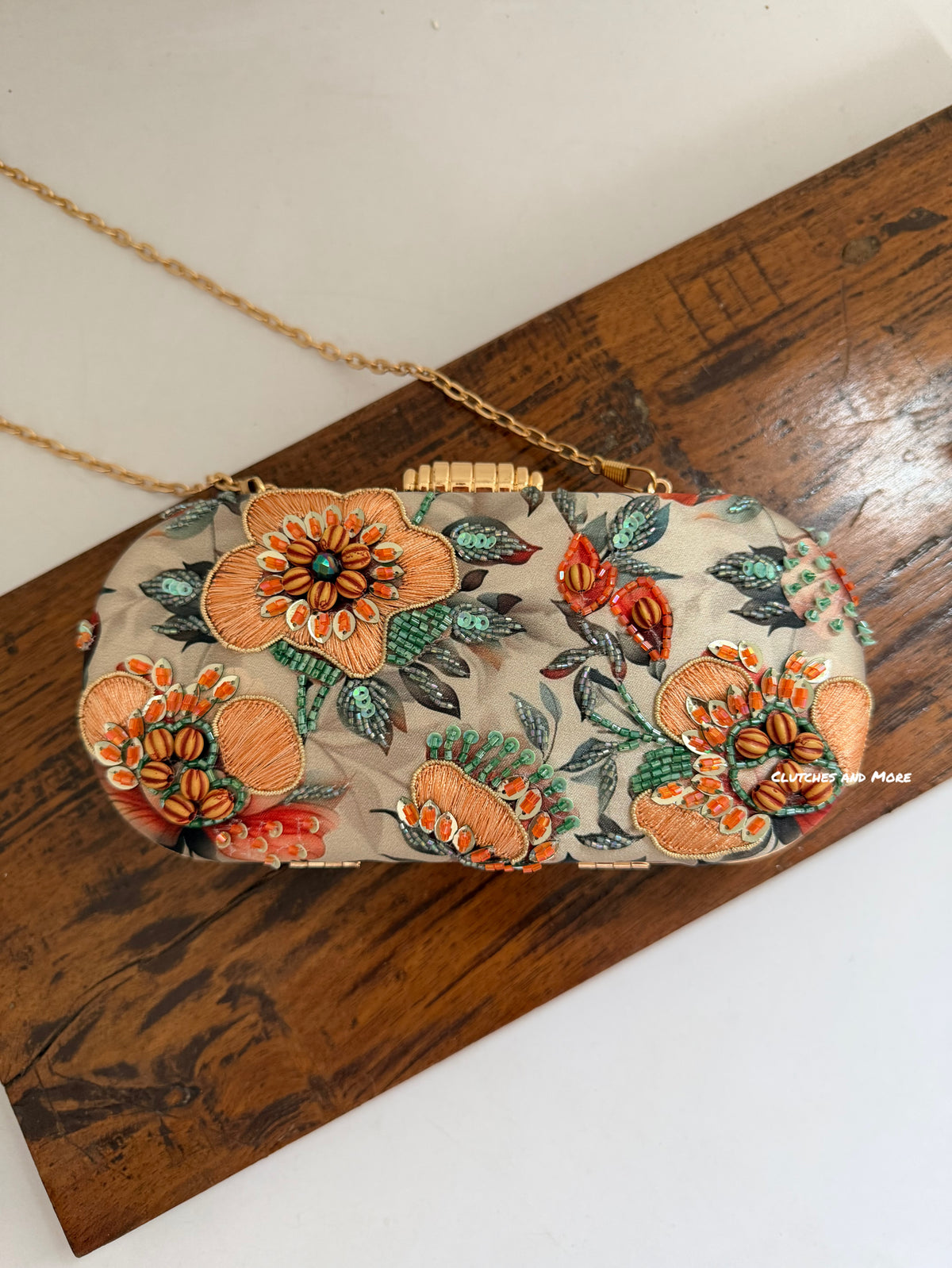 Poppy Floral Capsule Clutch Peach Green Multicoloured