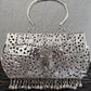 Designer Silver Brass Clutch With Bells