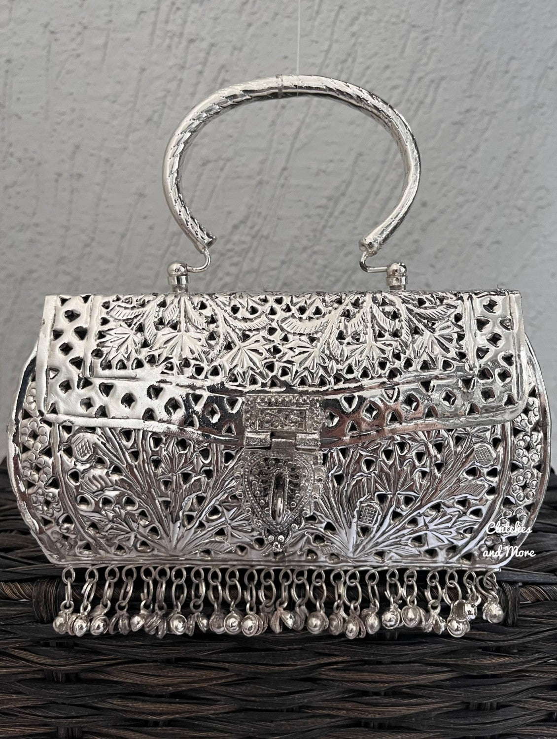 Designer Silver Brass Clutch With Bells