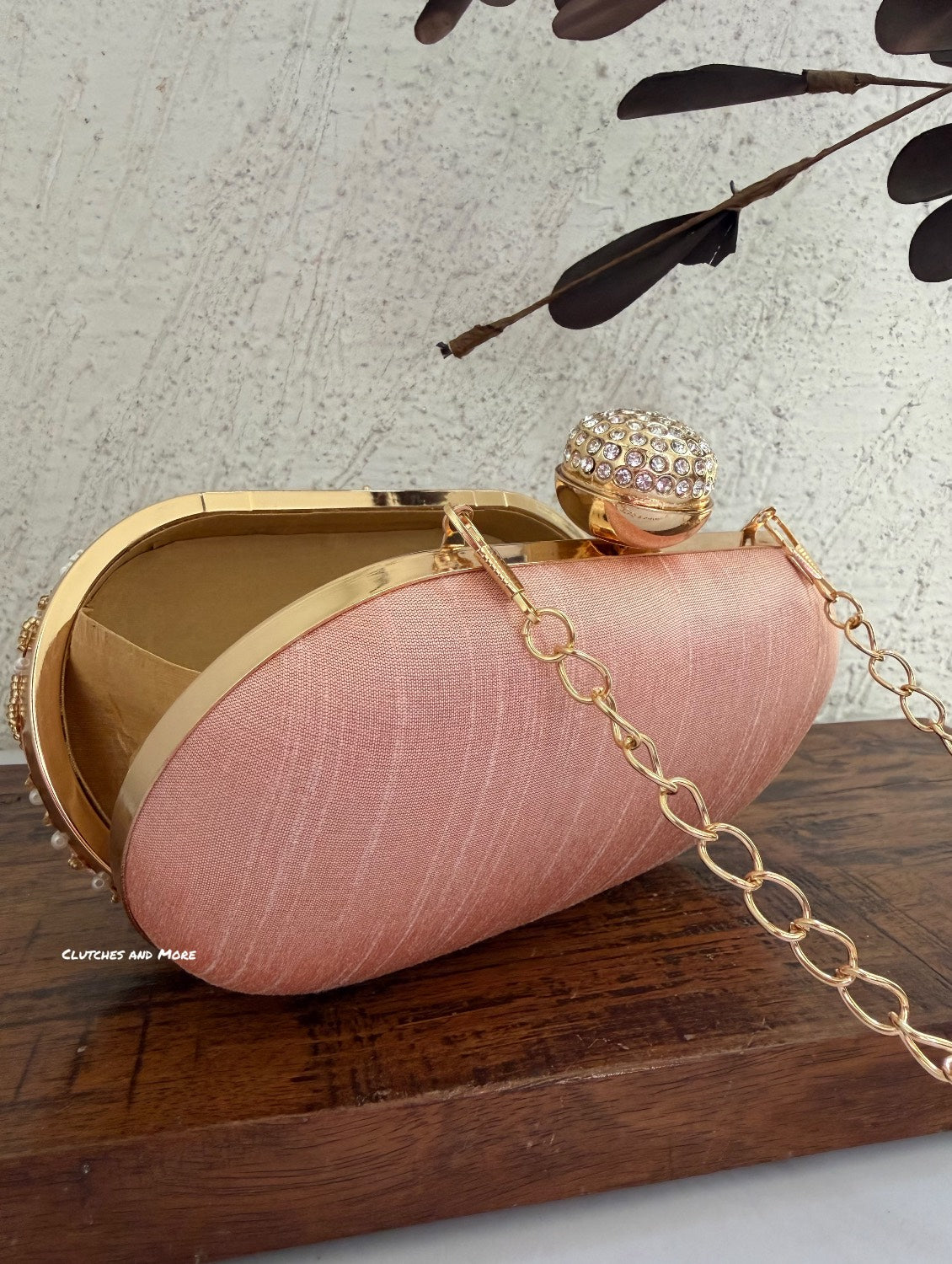 Aarohi Peach Capsule Clutch