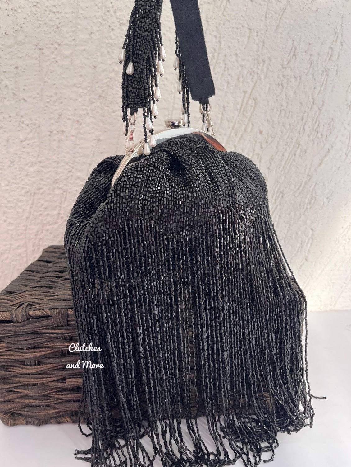 Black Batua Bag with long Tassles