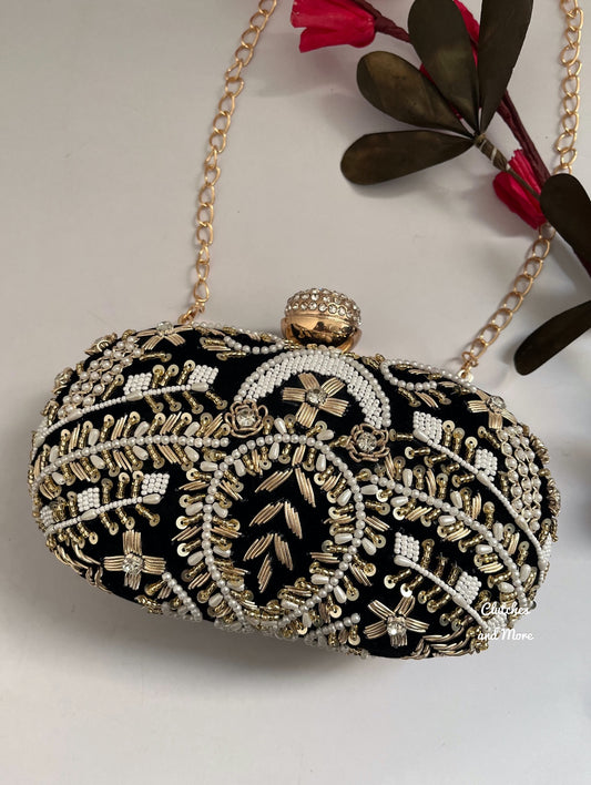 Aarohi Black Capsule clutch