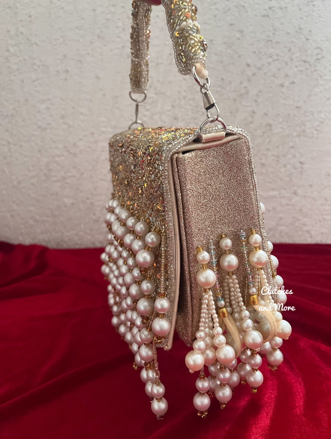 Jodha Pearl Tassle Clutch Gold