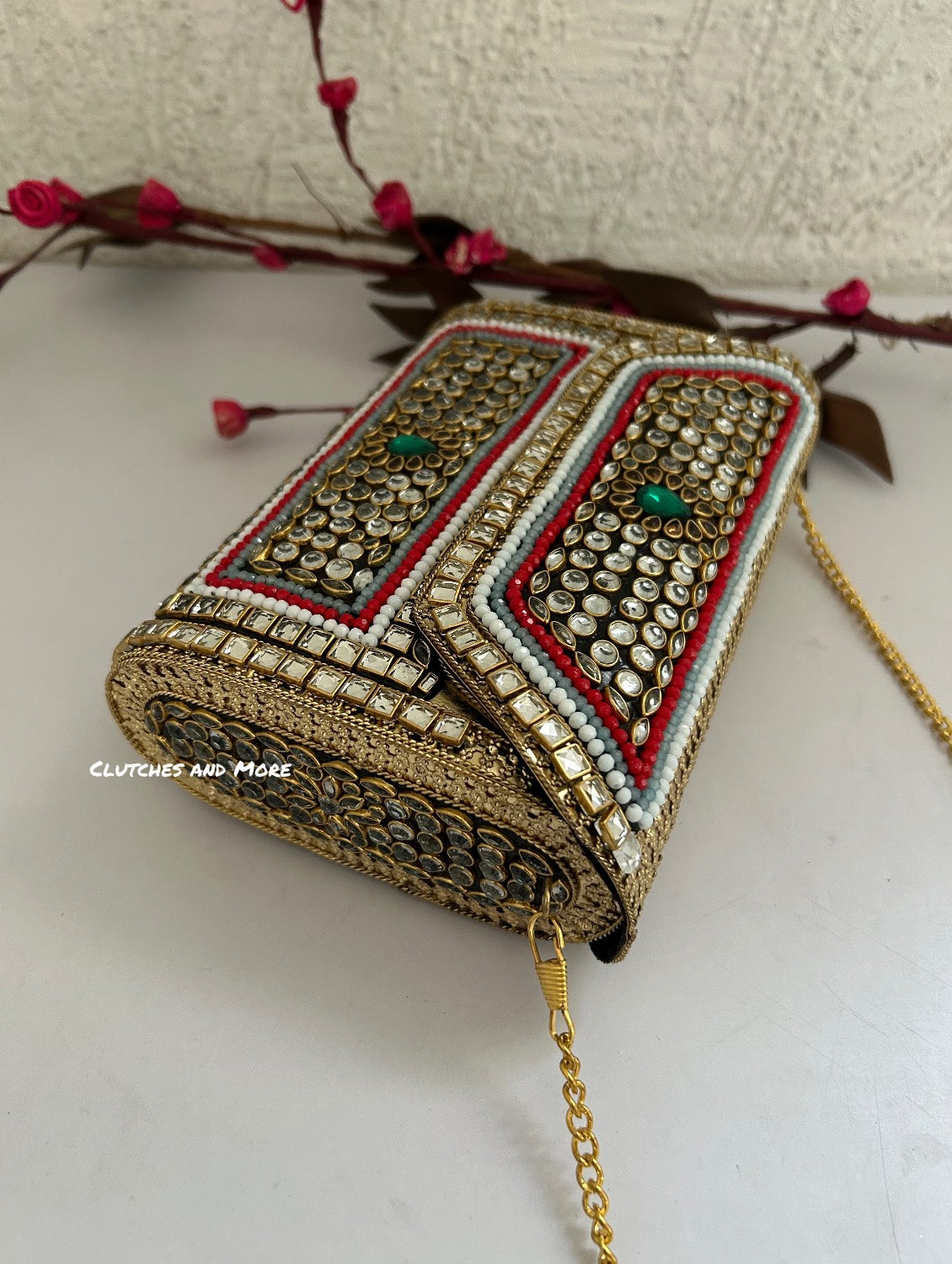 Kasika Kundan Brass Clutch Multicolored