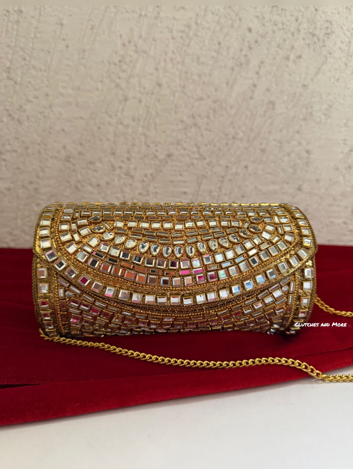 Kasika Kundan Brass Clutch Cylindrical Gold