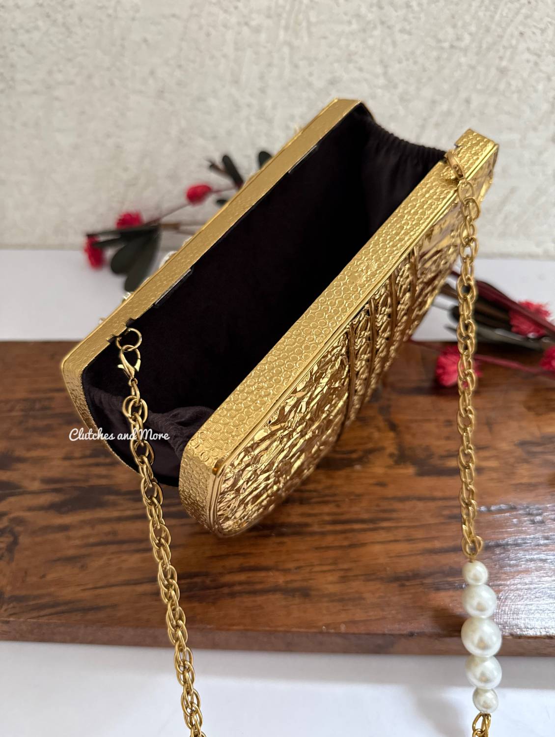 Half moon mother of pearl clutch