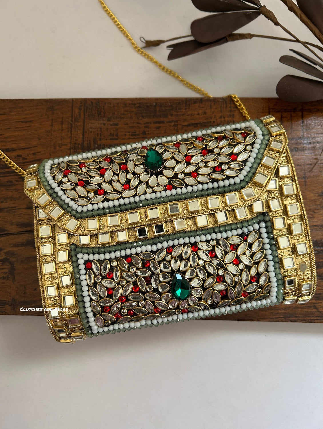 Kasika Kundan Brass Clutch Multicolored
