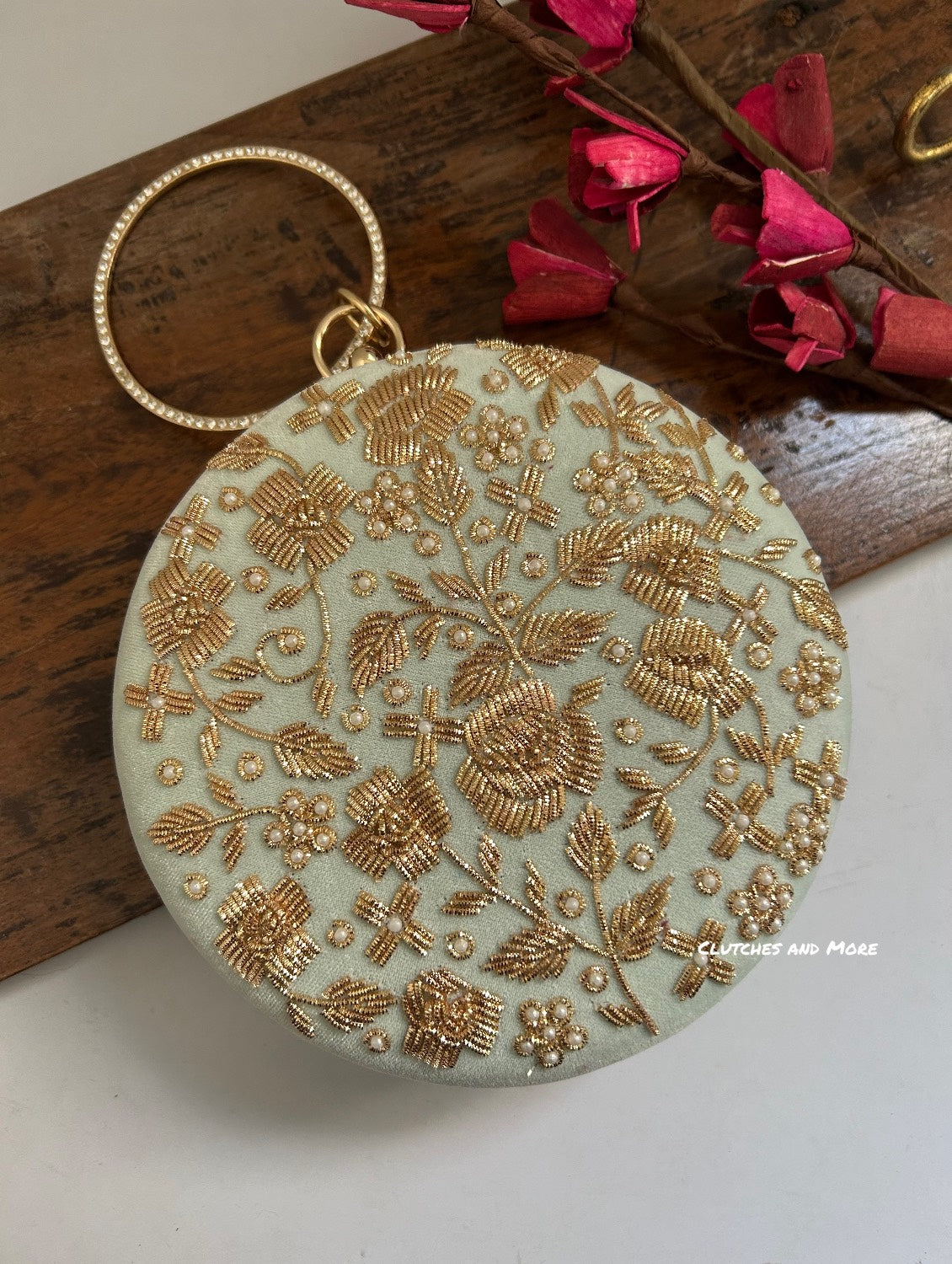 Aanya Light Blue Round Clutch