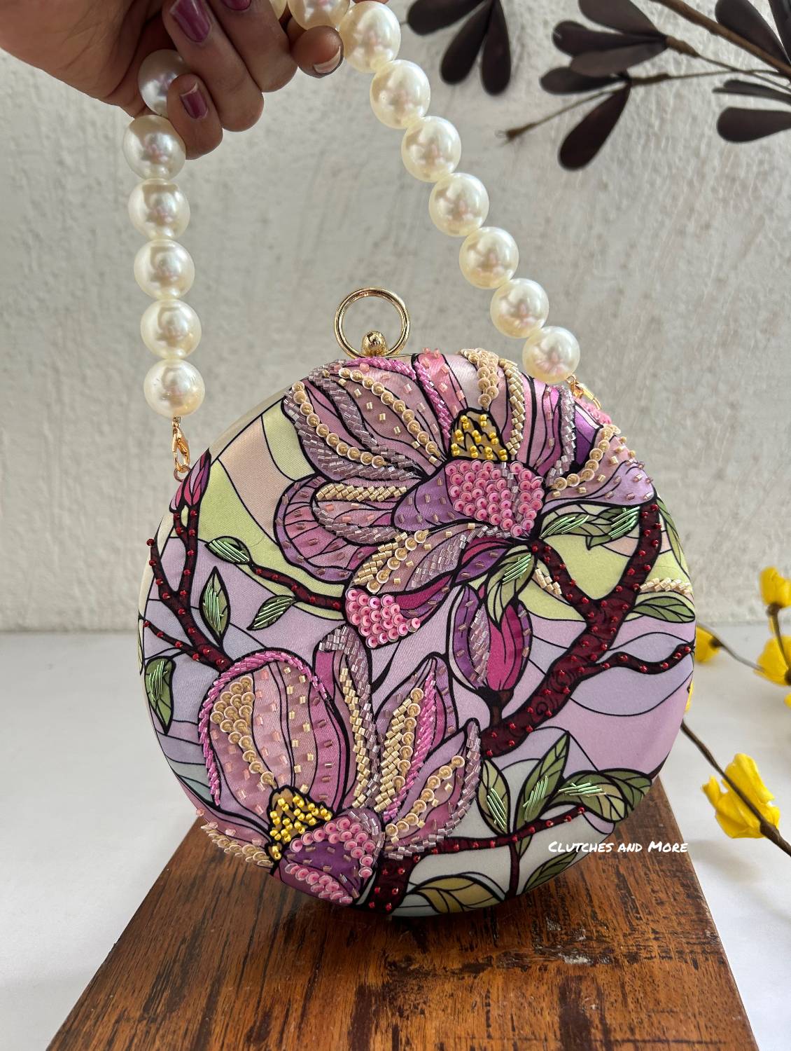 Poppy Floral Round Multicolored Clutch ( Lavender Base )