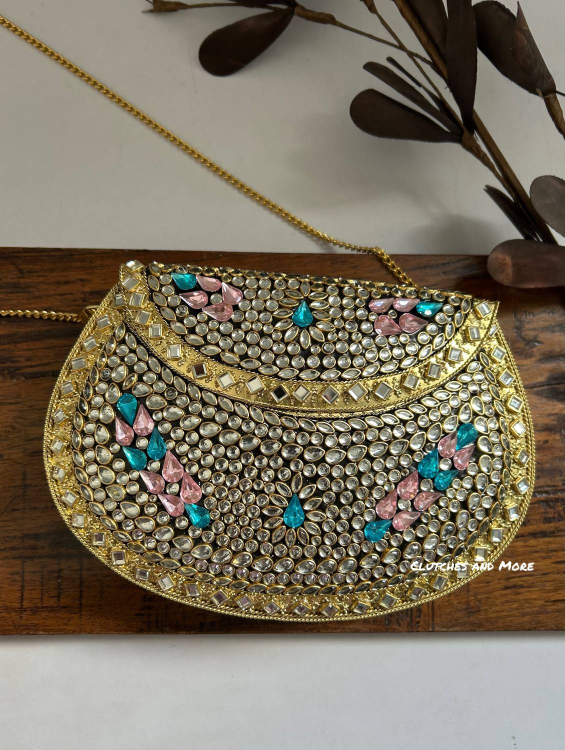 Kasika Kundan Brass Clutch with Pink Blue