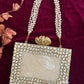 Kundan Resin clutch with Pearl Handle