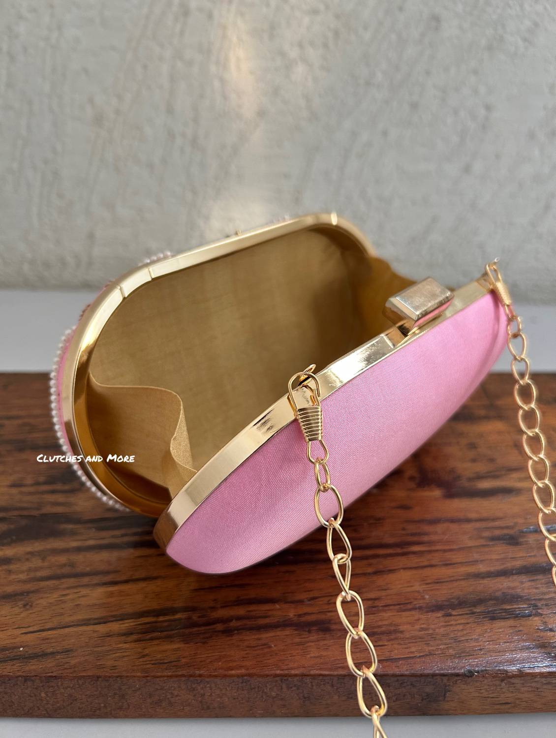 Alya pink capsule Clutch