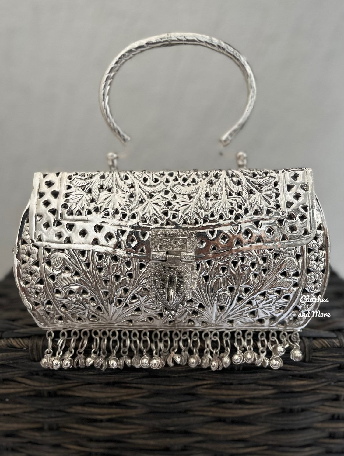 Designer Silver Brass Clutch With Bells