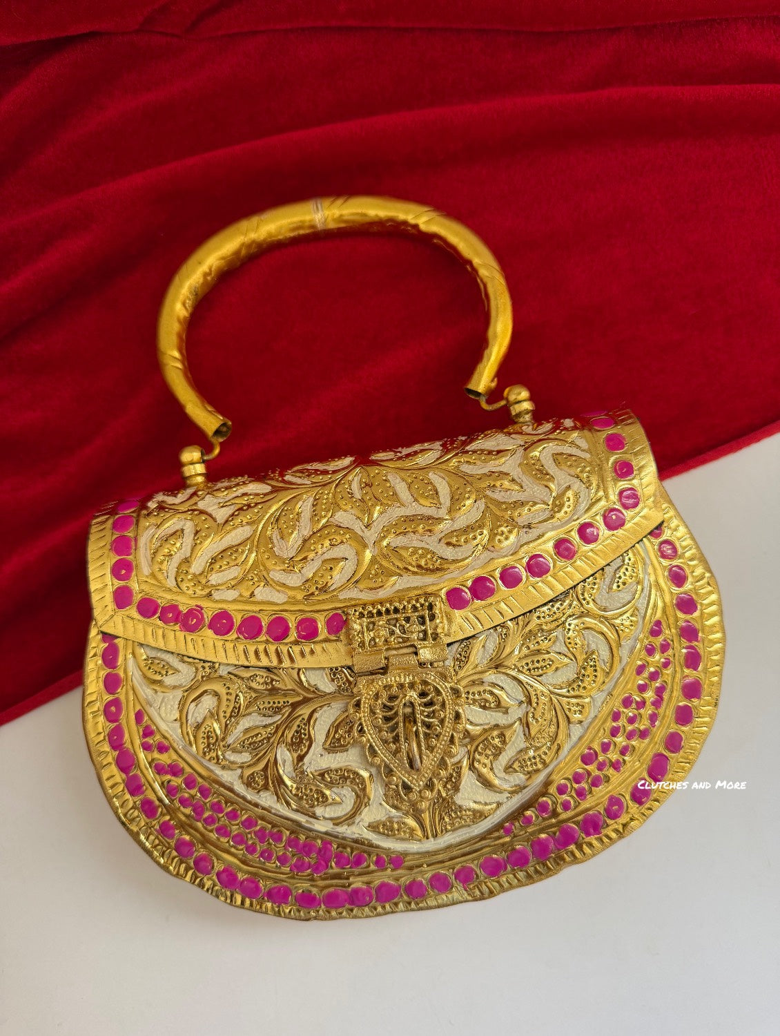 Multcolored brass clutch with Gold Base