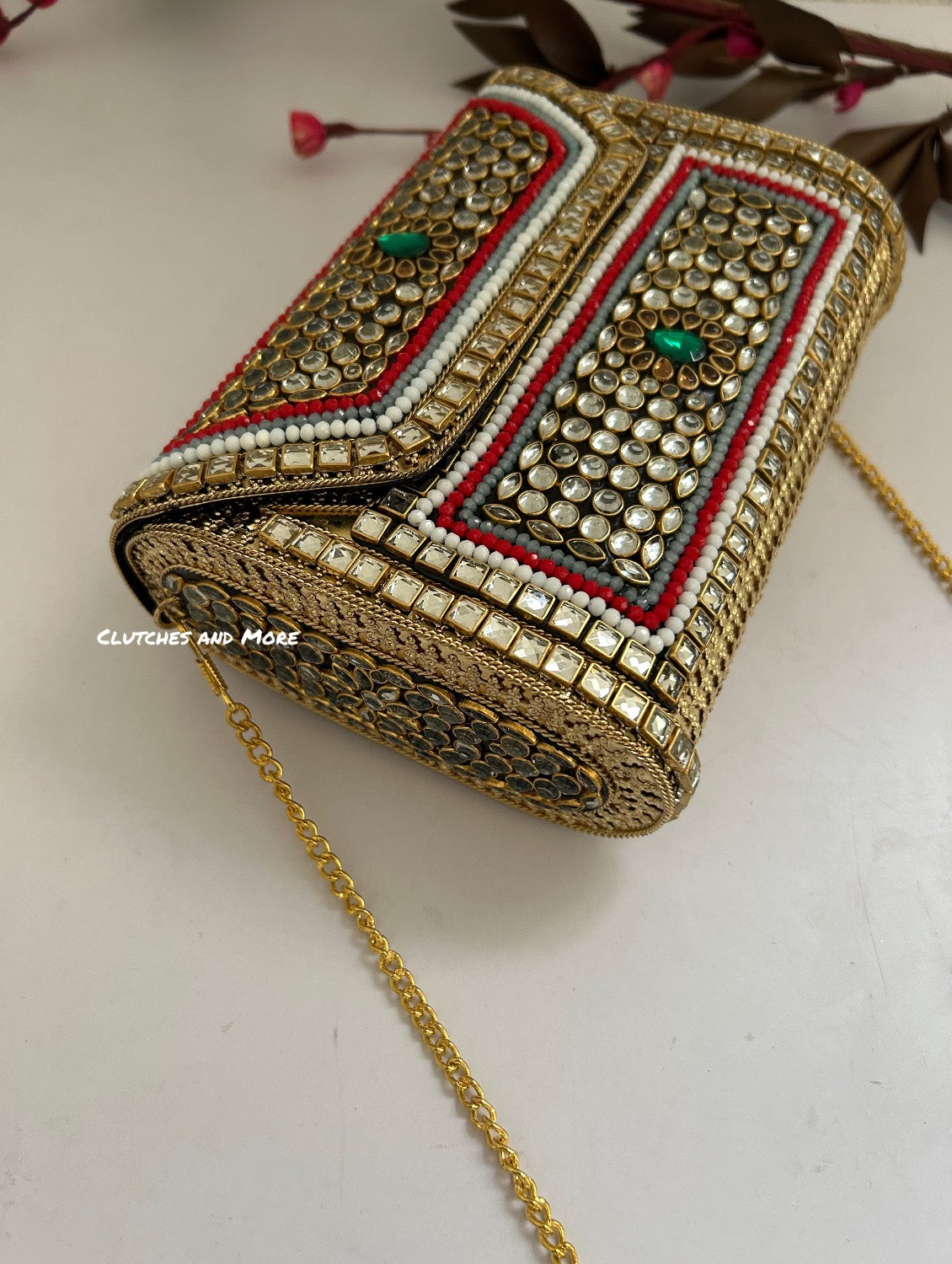 Kasika Kundan Brass Clutch Multicolored