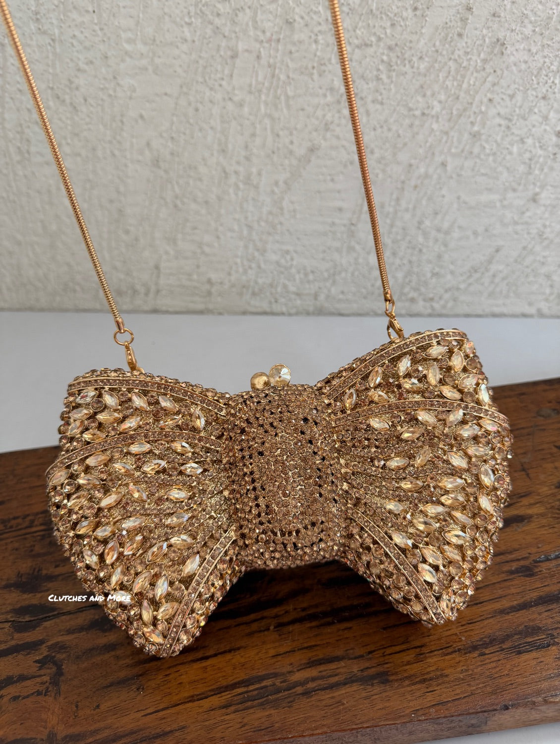 Regal Crystal Bow Clutch