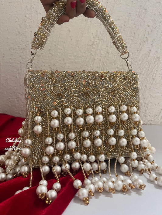 Jodha Pearl Tassle Clutch Gold