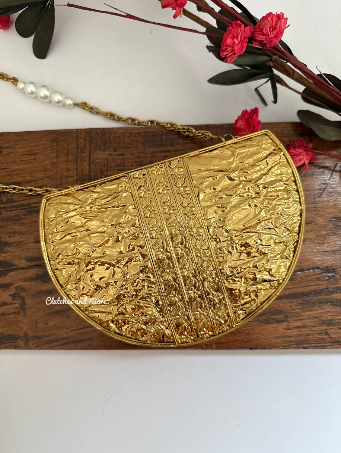 Half moon mother of pearl clutch