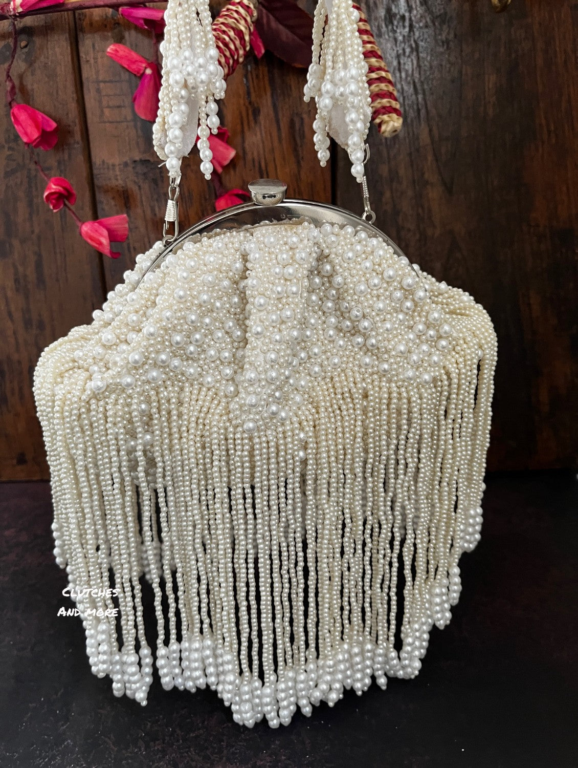 White pearl batua bag