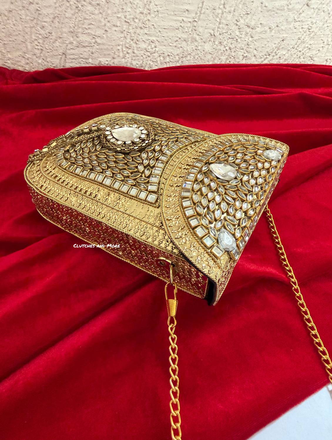 Kasika Kundan Brass Mobile Clutch