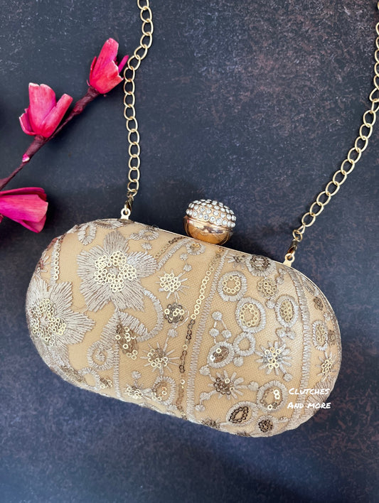 Gold Floral capsule clutch