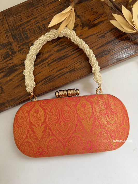Adaa Banarsi Clutch Carrot Color