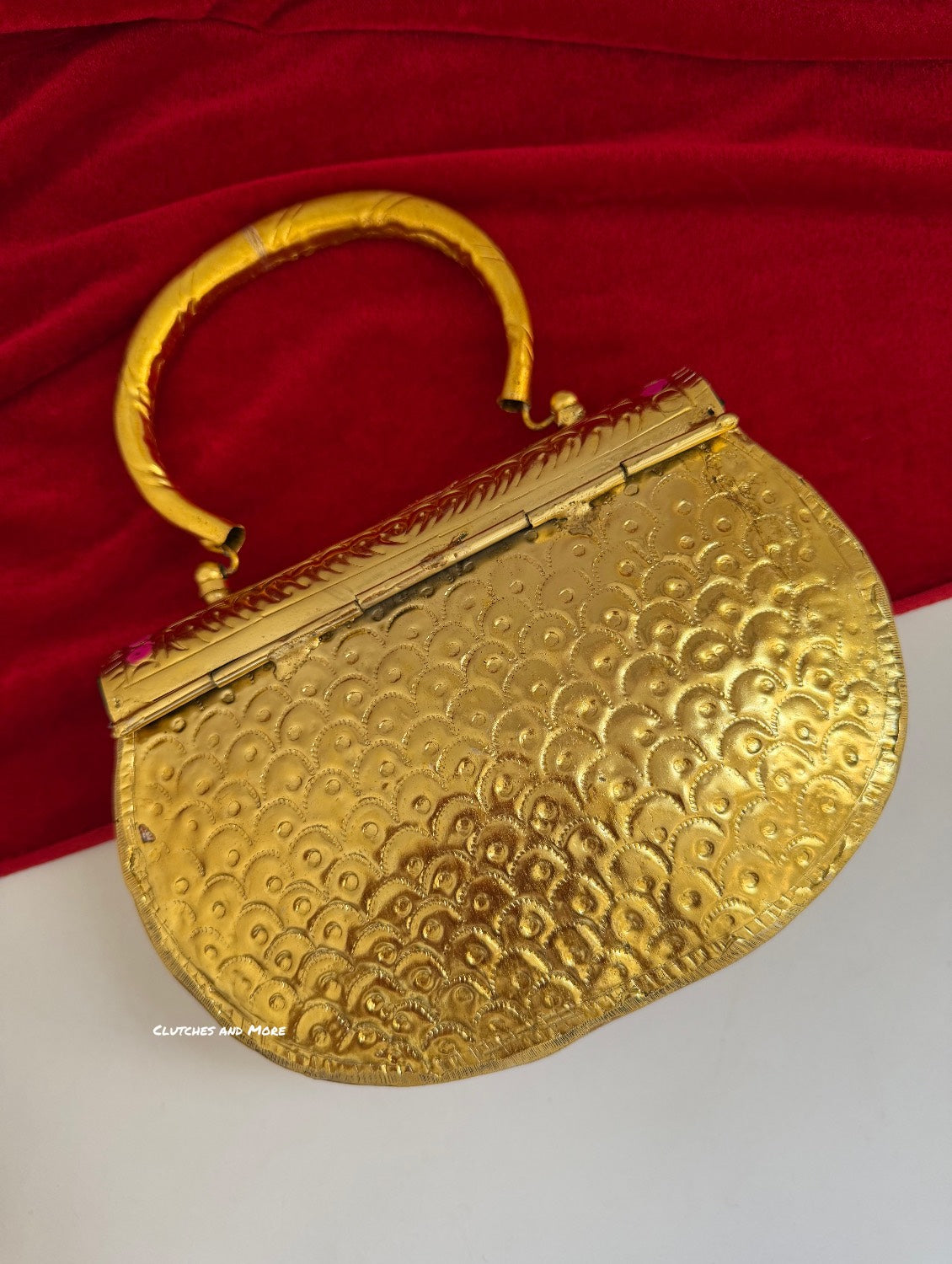 Multcolored brass clutch with Gold Base