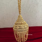 Mini Metal Potli Bag With Tassle ( Gold )