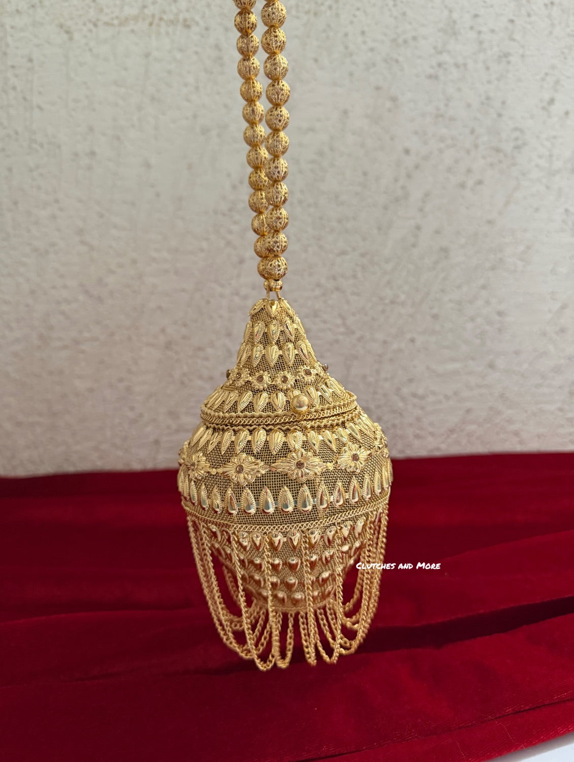 Mini Metal Potli Bag With Tassle ( Gold )