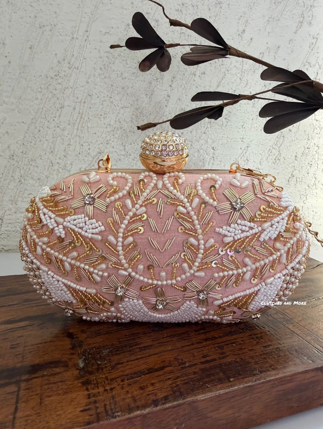 Aarohi Peach Capsule Clutch