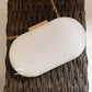 White capsule clutch