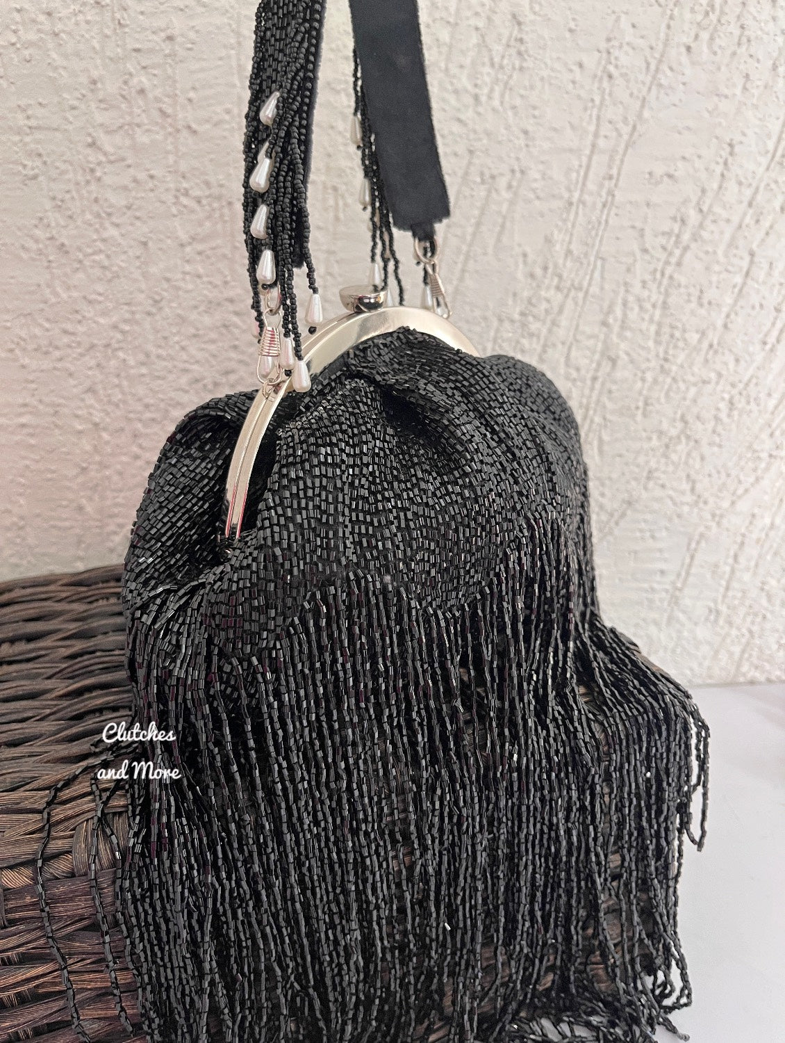 Black Batua Bag with long Tassles