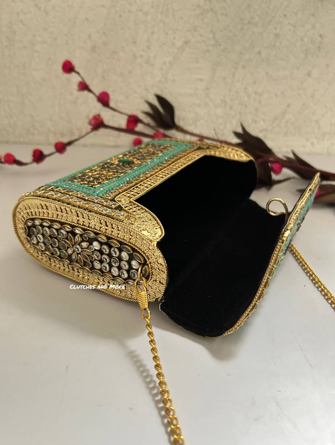Kasika Kundan Brass Clutch Multicolored
