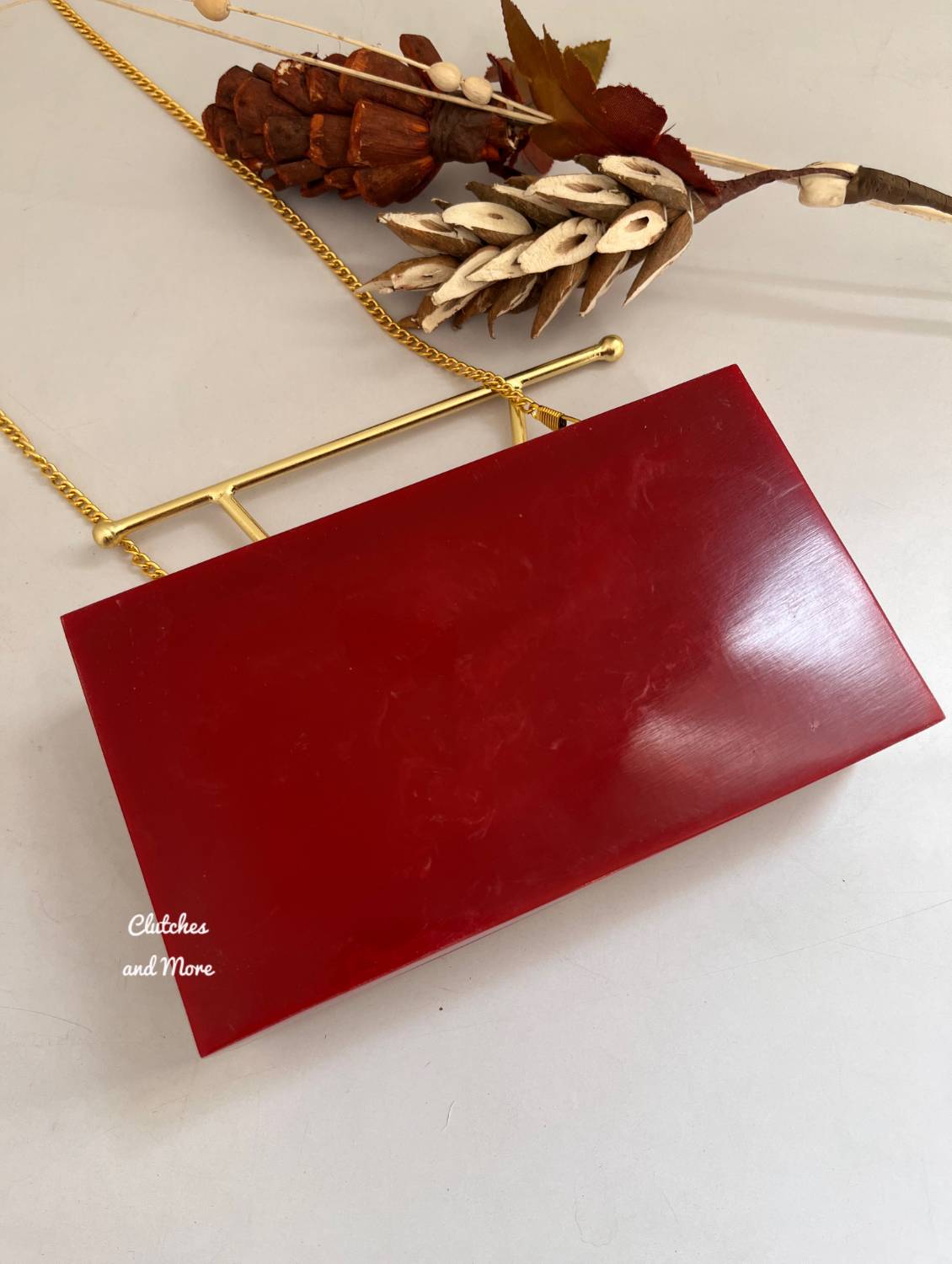 Red Handheld Premium Resin Clutch