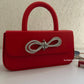 Scarlett Bow Sling bag Red