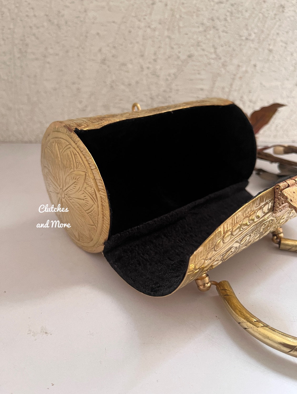 Cylindrical brass clutch Gold