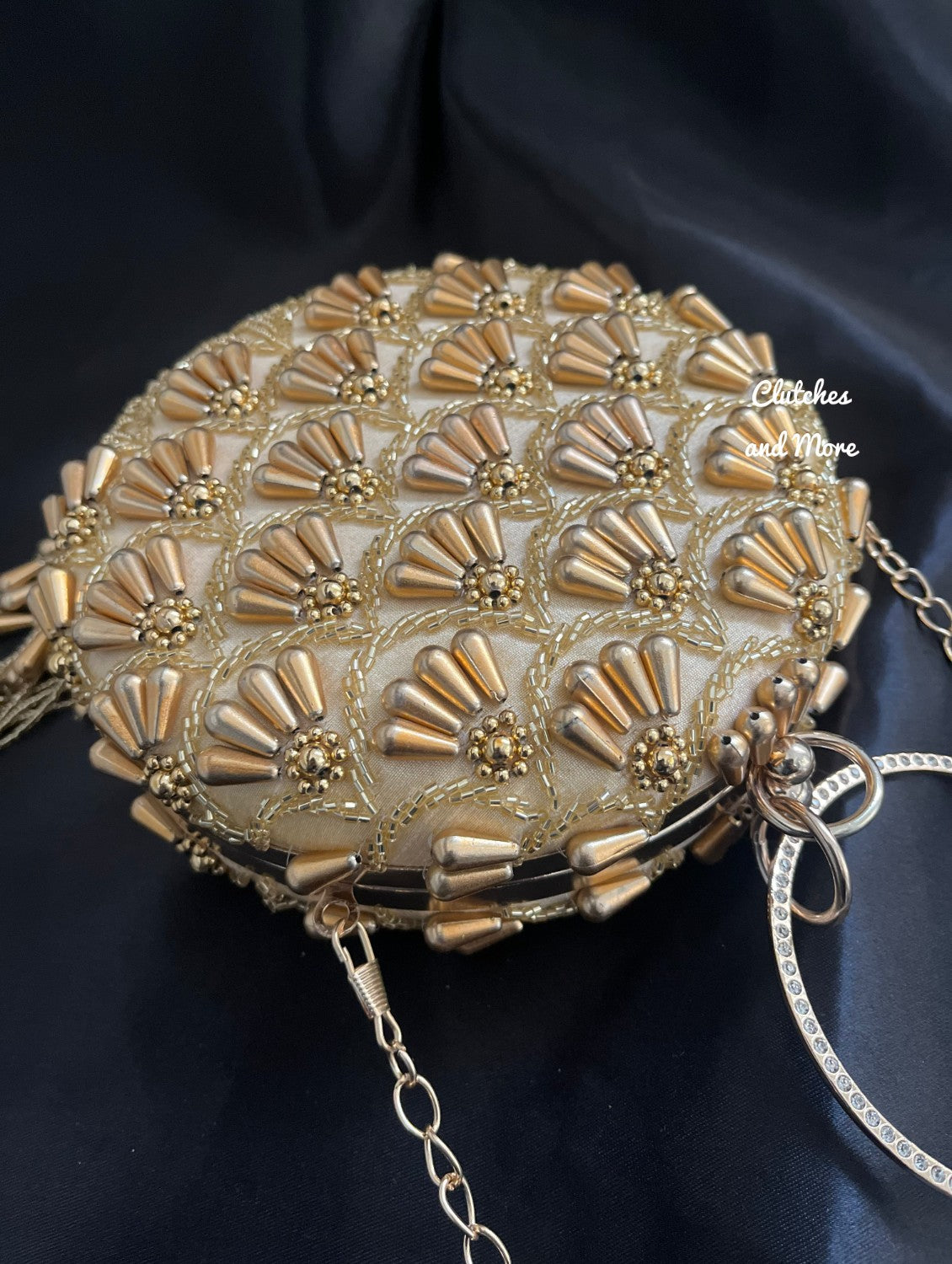 Praneeta Gold Pearl Droplets Round Clutch