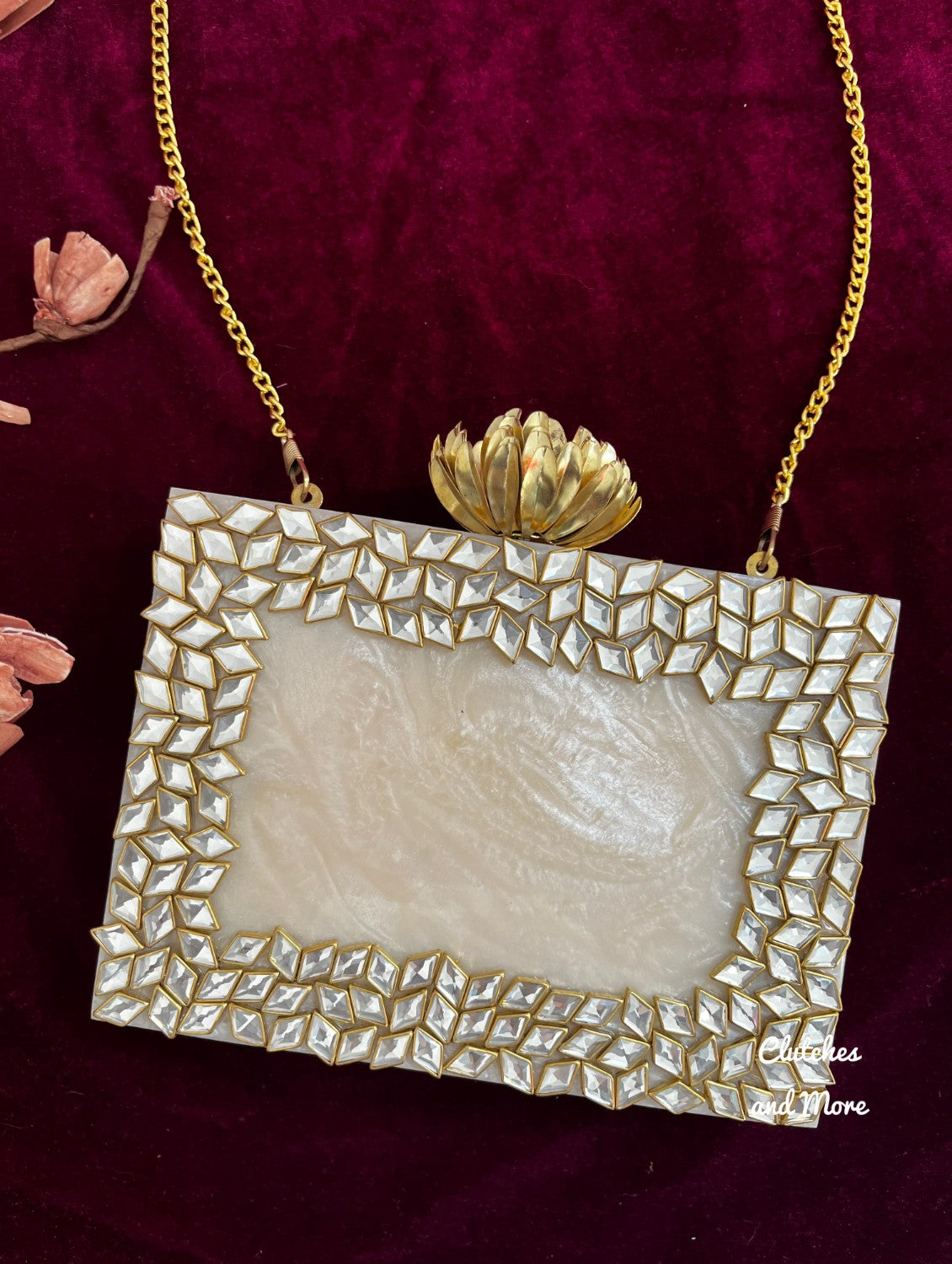 Kundan Resin clutch with Pearl Handle