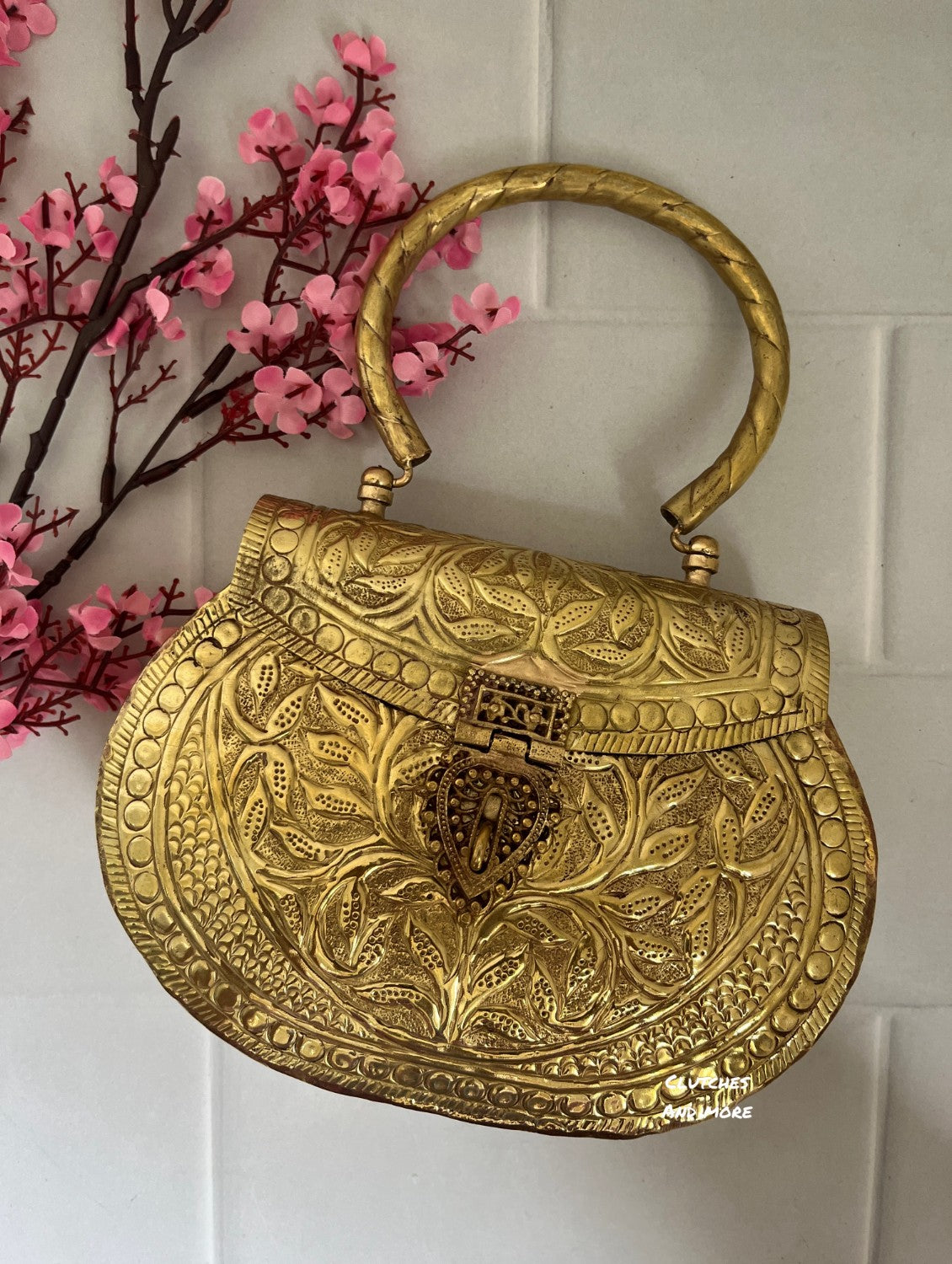 Gold brass clutch with handle