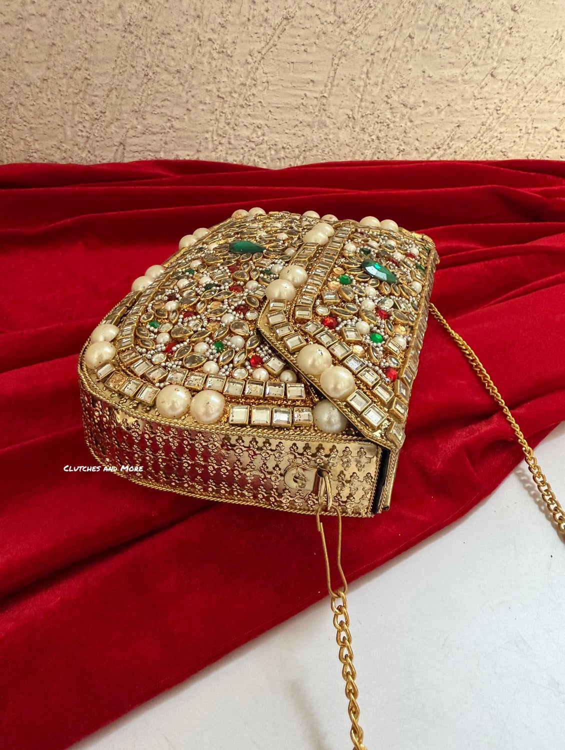 Kasika Kundan Brass Clutch Pearl Multicolored