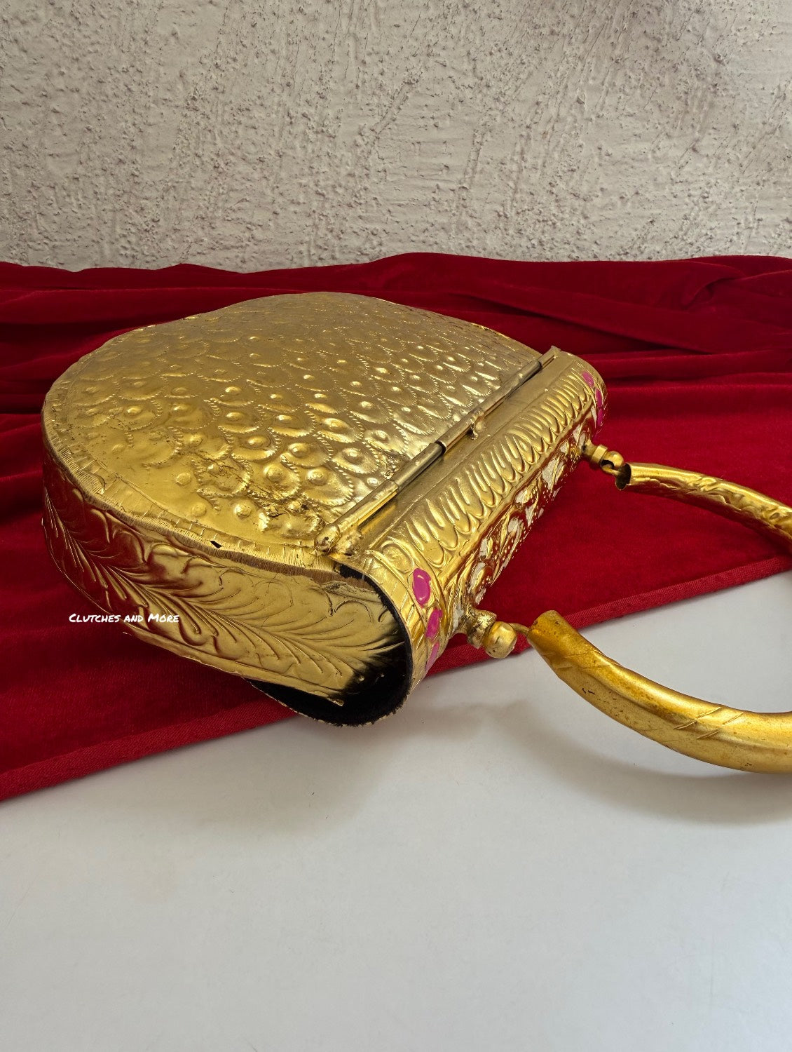 Multcolored brass clutch with Gold Base