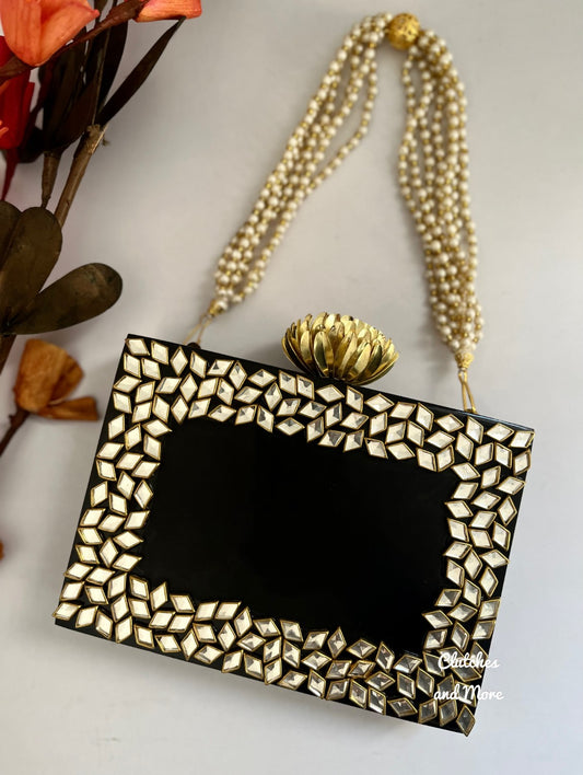 Kundan Black Resin clutch with Pearl Handle