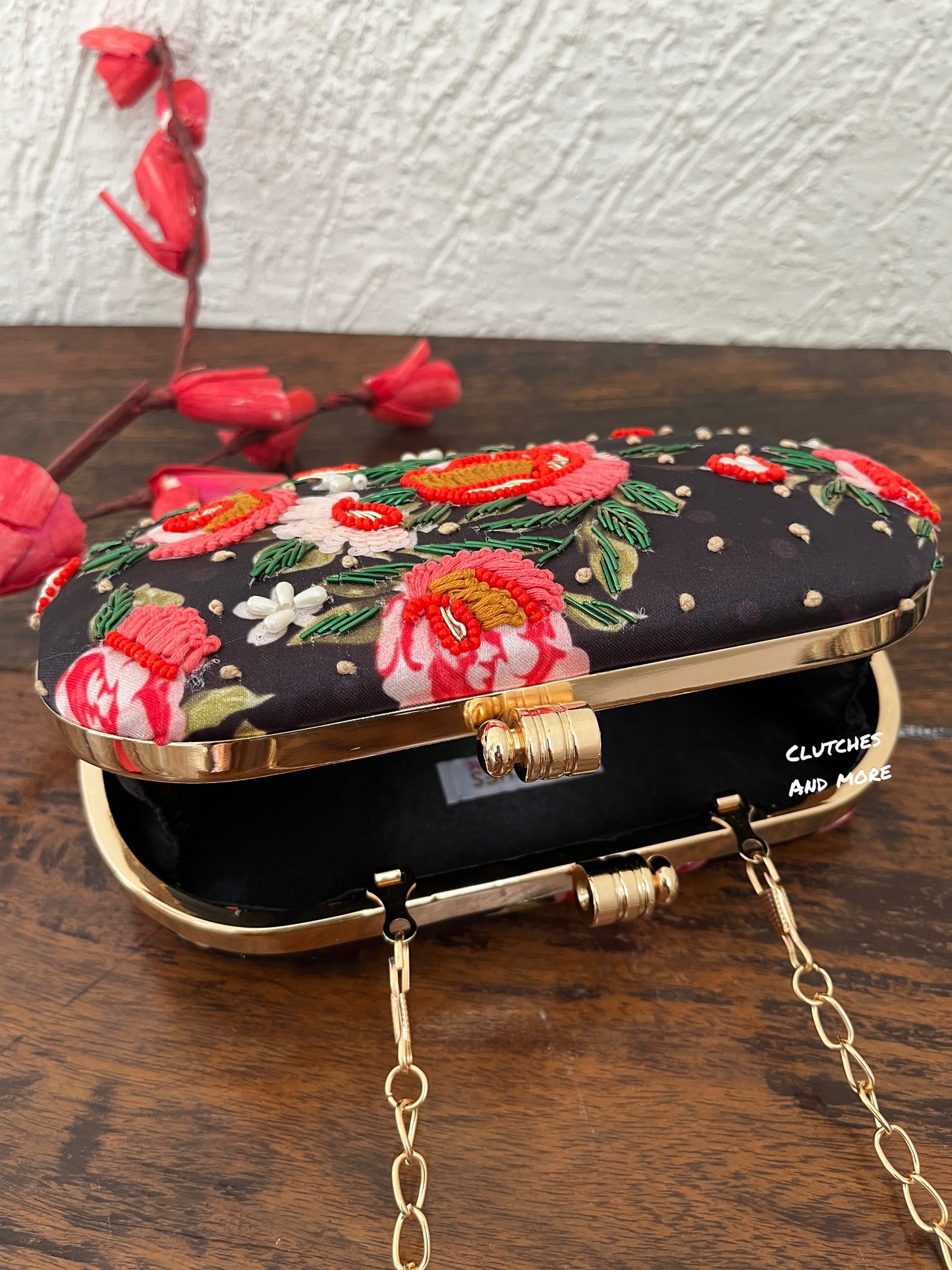 Black Floral capsule clutch