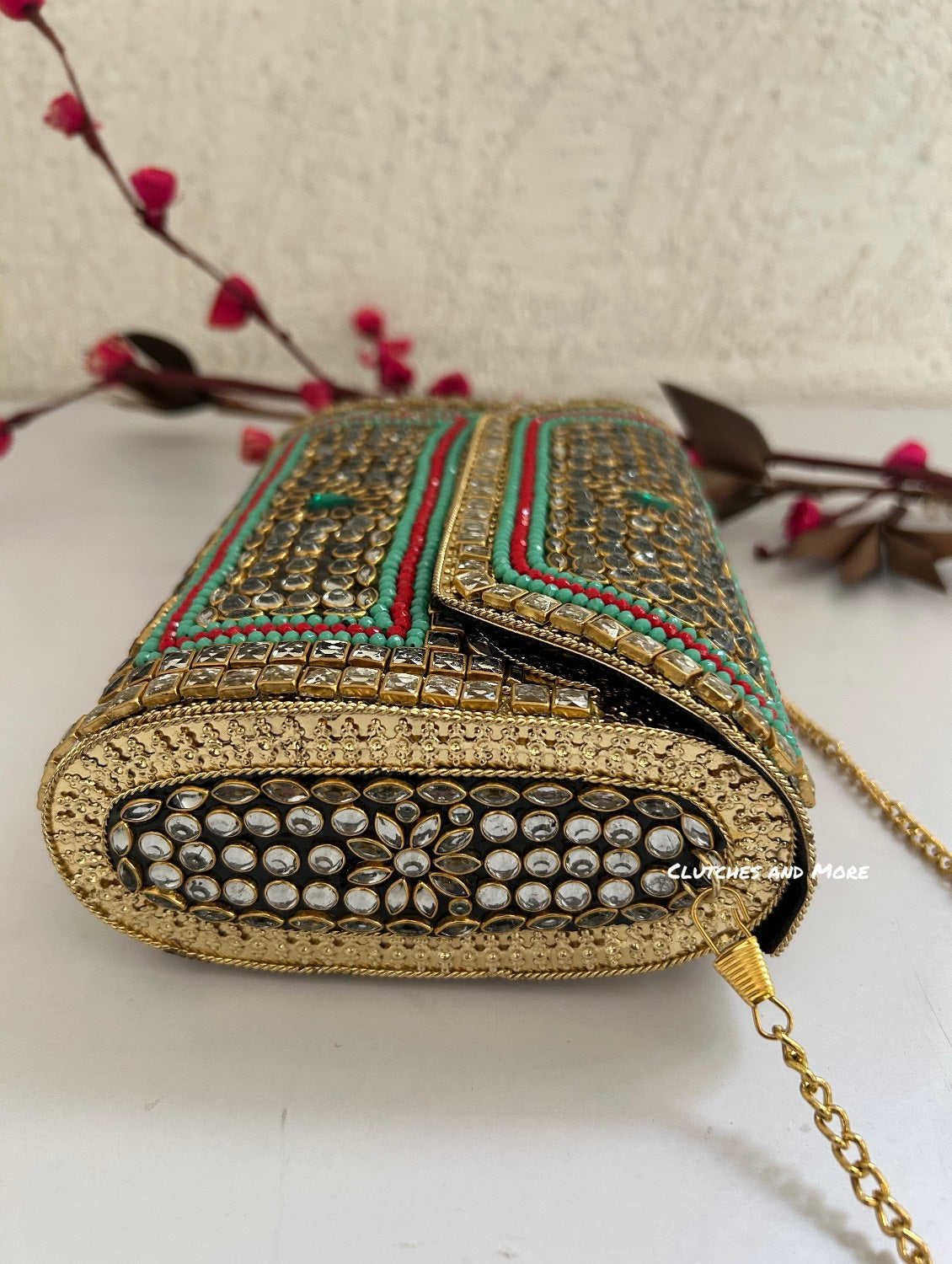 Kasika Kundan Brass Clutch Multicolored