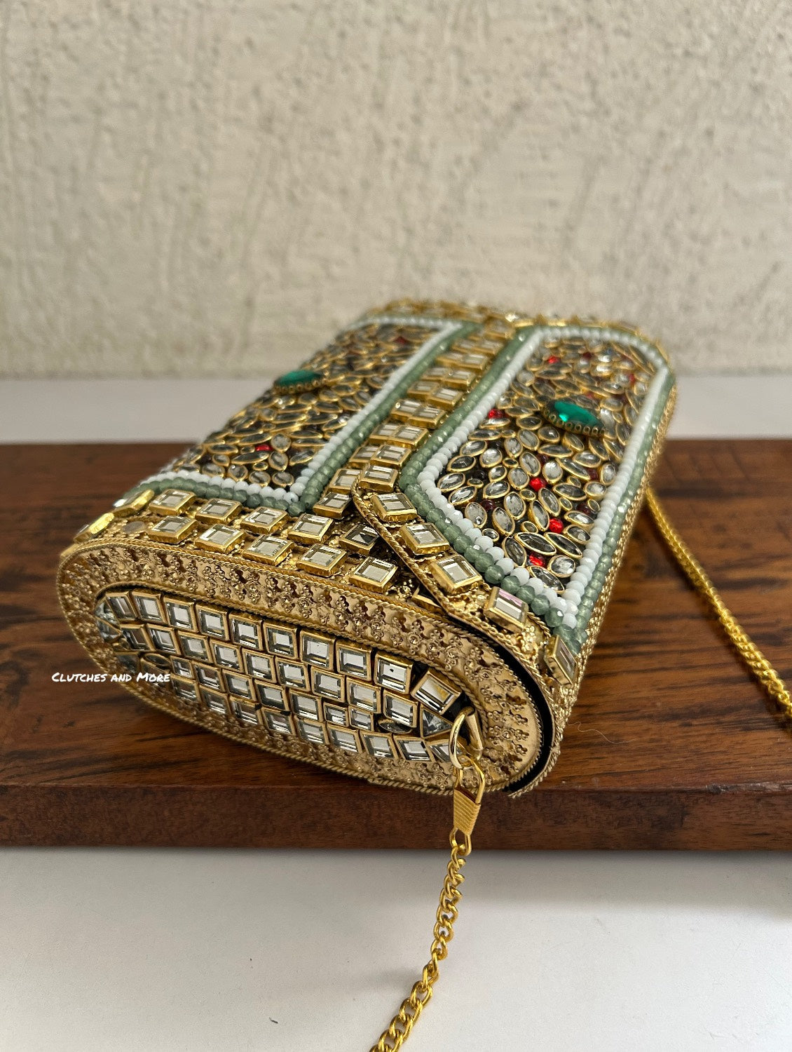 Kasika Kundan Brass Clutch Multicolored