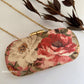Poppy Floral Capsule Clutch Peach Base
